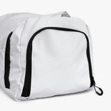 Side pocket for shoes or damp clothing