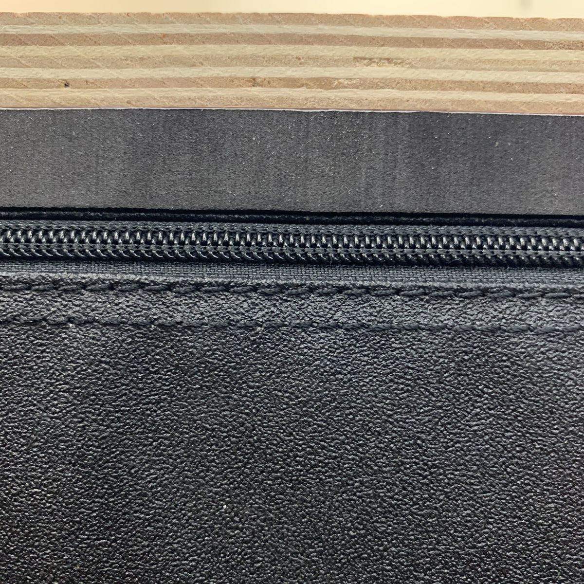 The Wood, Foam, Zipper, and Anti-Slip Cover 