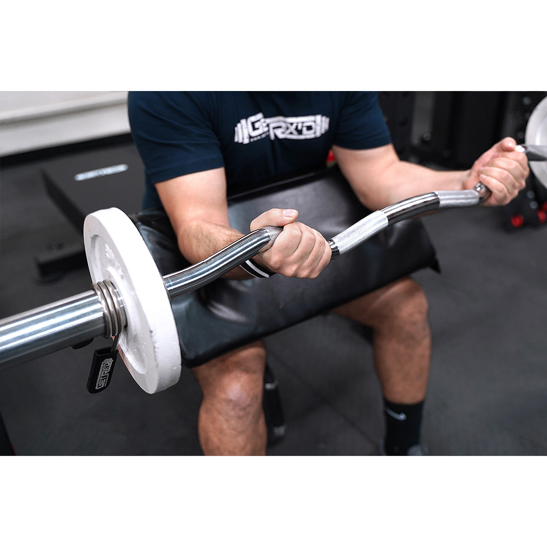 Perform preacher curls using an Edge Set pad